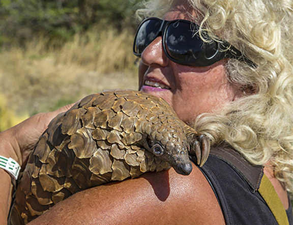 ictured: Ericka with Honeybun the pangolin at Rare Endangered Species